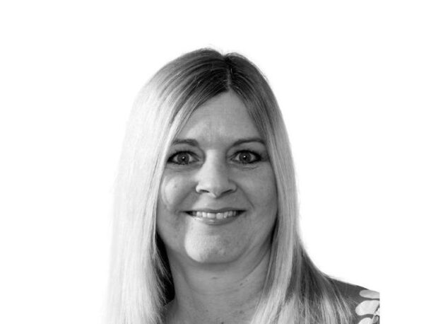 A black and white photo of Caroline Rudoni