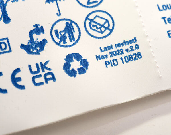 A close-up of the recycling information on CliniSure sheath packaging.