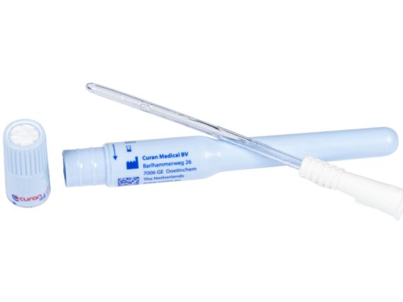 A Curan Lady gel catheter resting on top of it's container