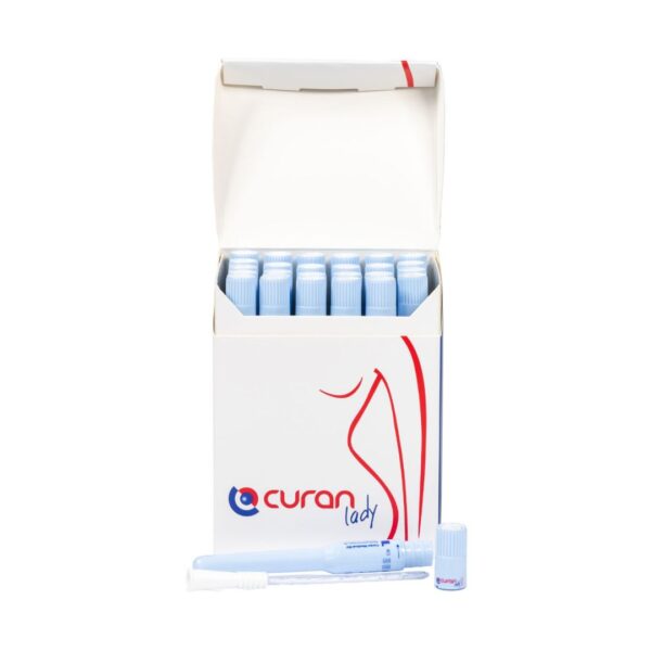 An open box of Curan Lady with an unscrewed Curan Lady catheter on its side at the base.