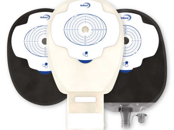 Three Aura Plus stoma bags, a black closed bag, a sand drainable bag and a black urostomy bag.