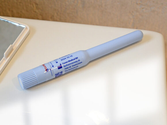 Curan lady catheter on a sink with a mirror.
