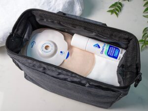 Aura Plus soft convex closed sand in a bag with CliniPeel Medical Adhesive Remover spray.