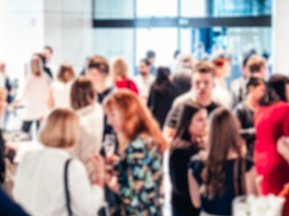 blurred image of a crowd at an event