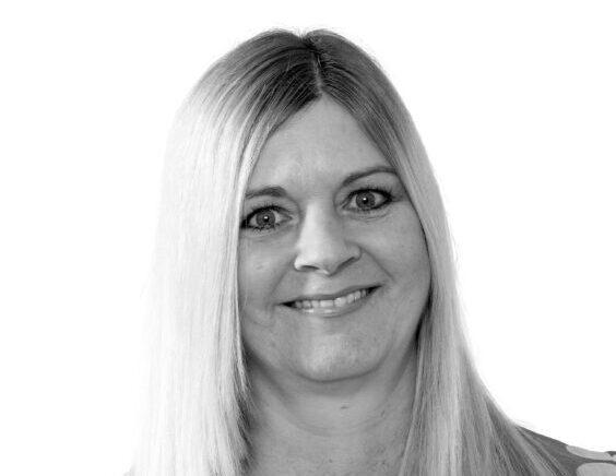 headshot of Caroline Rudoni in black and white