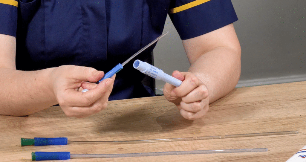 Louise Harrison showing a gel catheter