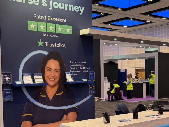 Photo of our booth at ASCN 2025.