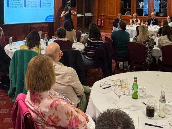 Dr Zainab Noor presenting her talk