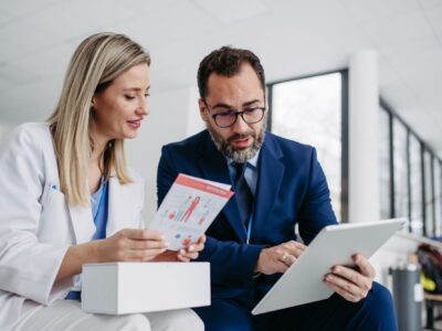 Product specialist talking to a clinician on a ward