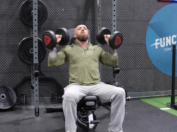 Image of Personal Trainer, Danny Callaghan in the gym doing weight training