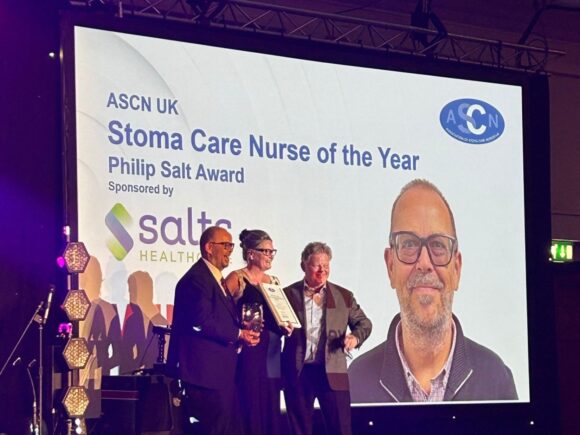 Photo of Kevin Hayles receiving the Stoma Care Nurse of the year award at ASCN 2026 (Association of Stoma Care Nurses)